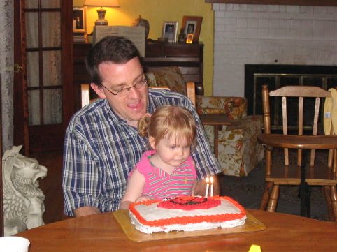 2004_08_05 Janes 2nd BDay blowing out candles with dad.jpg